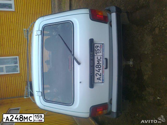 Фото автомобиля LADA 2121 NIVA, 2011 — госномер А248МС159. Цвет: ЯРКО-БЕЛЫЙ