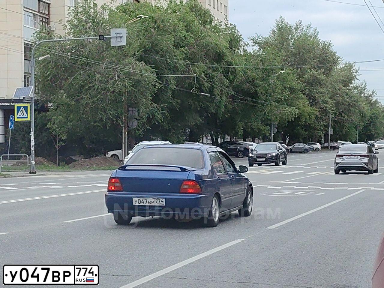 Фото автомобиля HONDA DOMANI, 1994 — госномер У047ВР774. Цвет: Темно-Синий