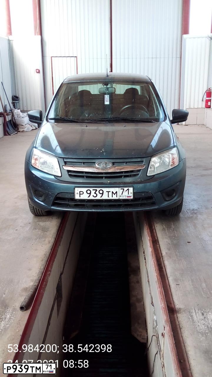 Фото автомобиля LADA 2190 GRANTA, 2015 — госномер Р939ТМ71. Цвет: СЕРО-СИНИЙ