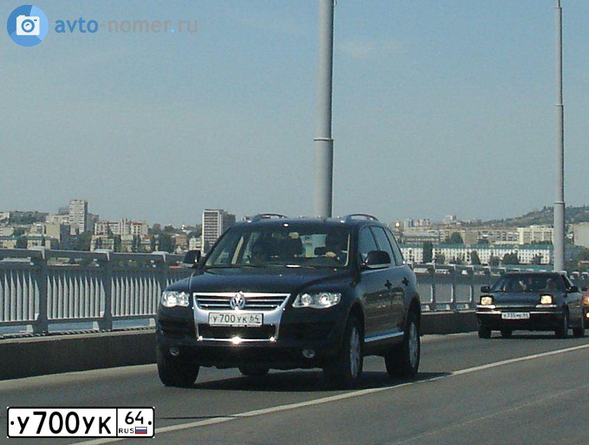 Фото автомобиля CHEVROLET NIVA, 2004 — госномер А165ТО164. Цвет: СЕРЕБРИСТЫЙ ЯРКО-КРАСНЫЙ