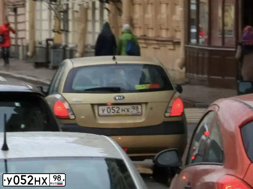 Фото автомобиля KIA RIO, 2009 — госномер А909НМ03. Цвет: БЕЖЕВЫЙ
