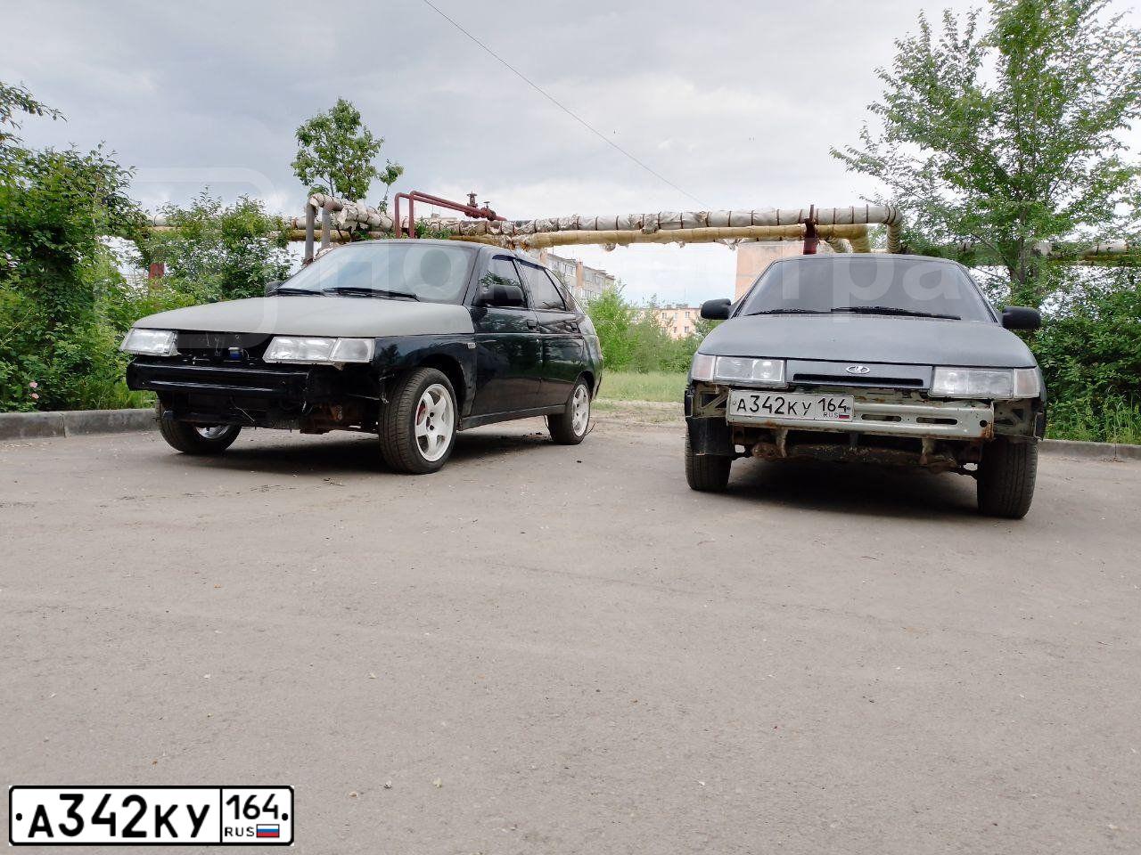 Фото автомобиля LADA 2112, 2002 — госномер А342КУ164. Цвет: СЕРЕБРИСТО ЖЕЛТО-ЗЕЛЕНЫЙ