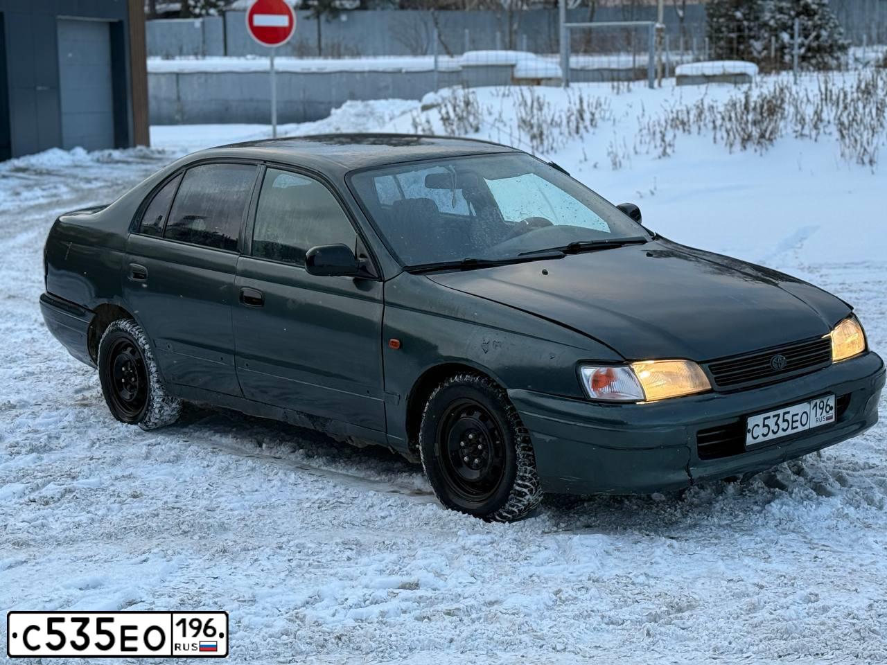 Фото автомобиля TOYOTA CARINA, 1994 — госномер С535ЕО196. Цвет: СЕРО-СИНИЙ