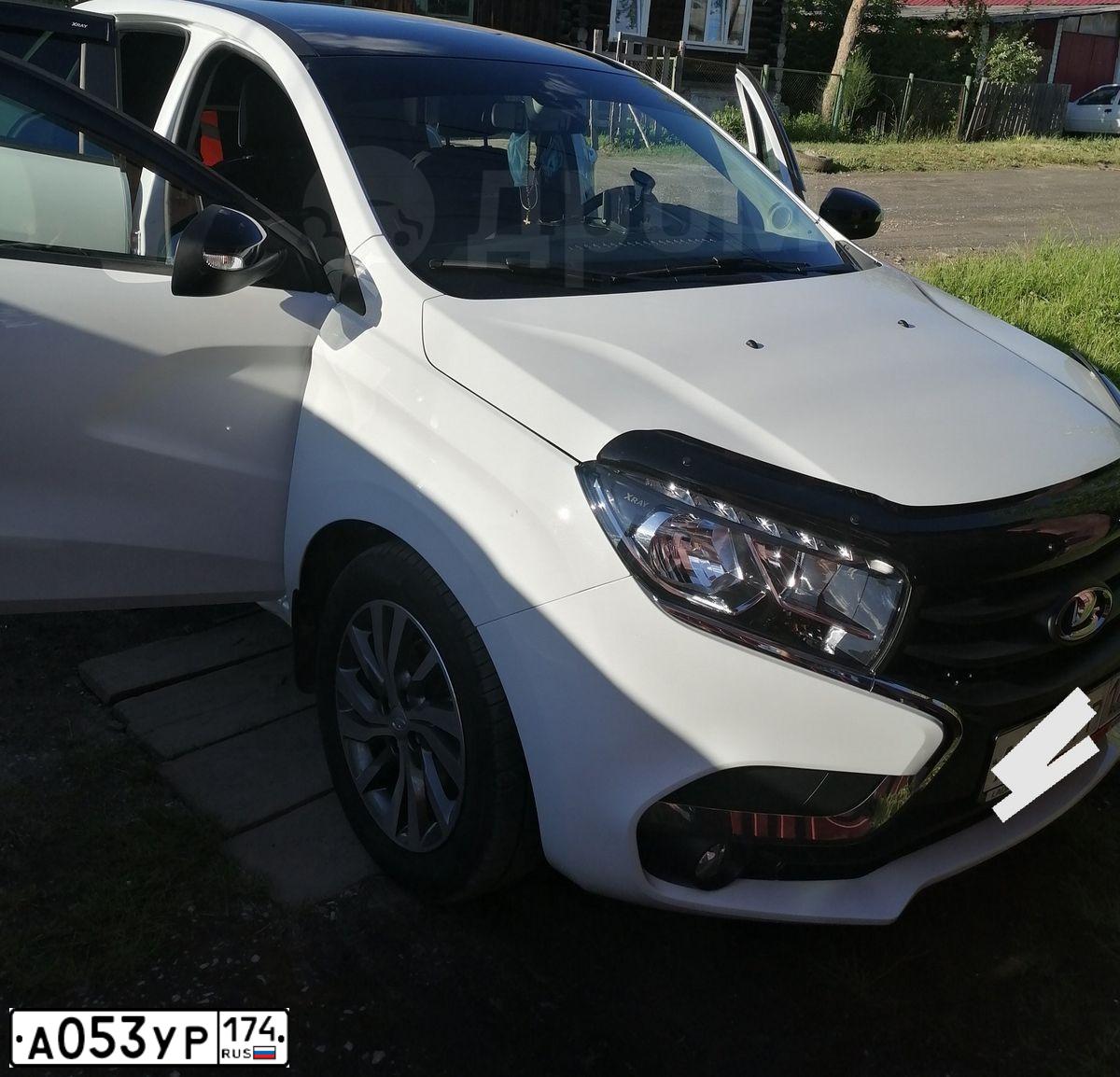 Фото автомобиля LADA XRAY, 2019 — госномер А053УР174. Цвет: Белый