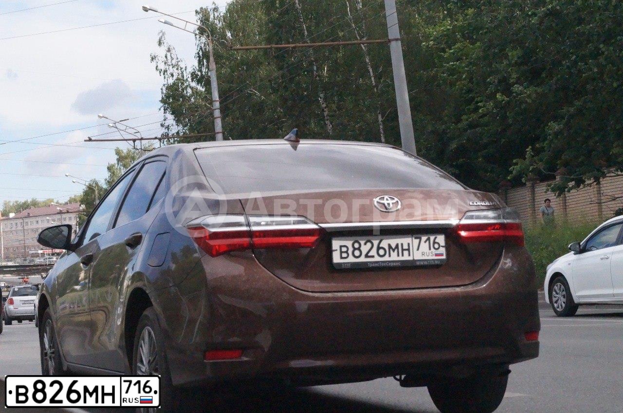 Фото автомобиля TOYOTA COROLLA, 2018 — госномер В826МН716. Цвет: ТЕМНО КОРИЧНЕВЫЙ