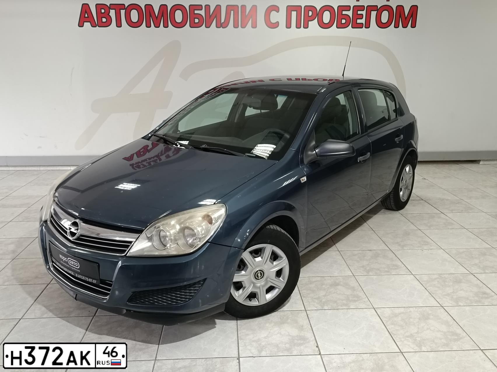 Фото автомобиля OPEL ASTRA, 2009 — госномер Р705КР46. Цвет: СЕРО-СИНИЙ