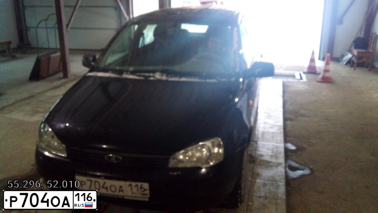 Фото автомобиля LADA 1117 KALINA, 2012 — госномер Р704ОА116. Цвет: Сине-Черный
