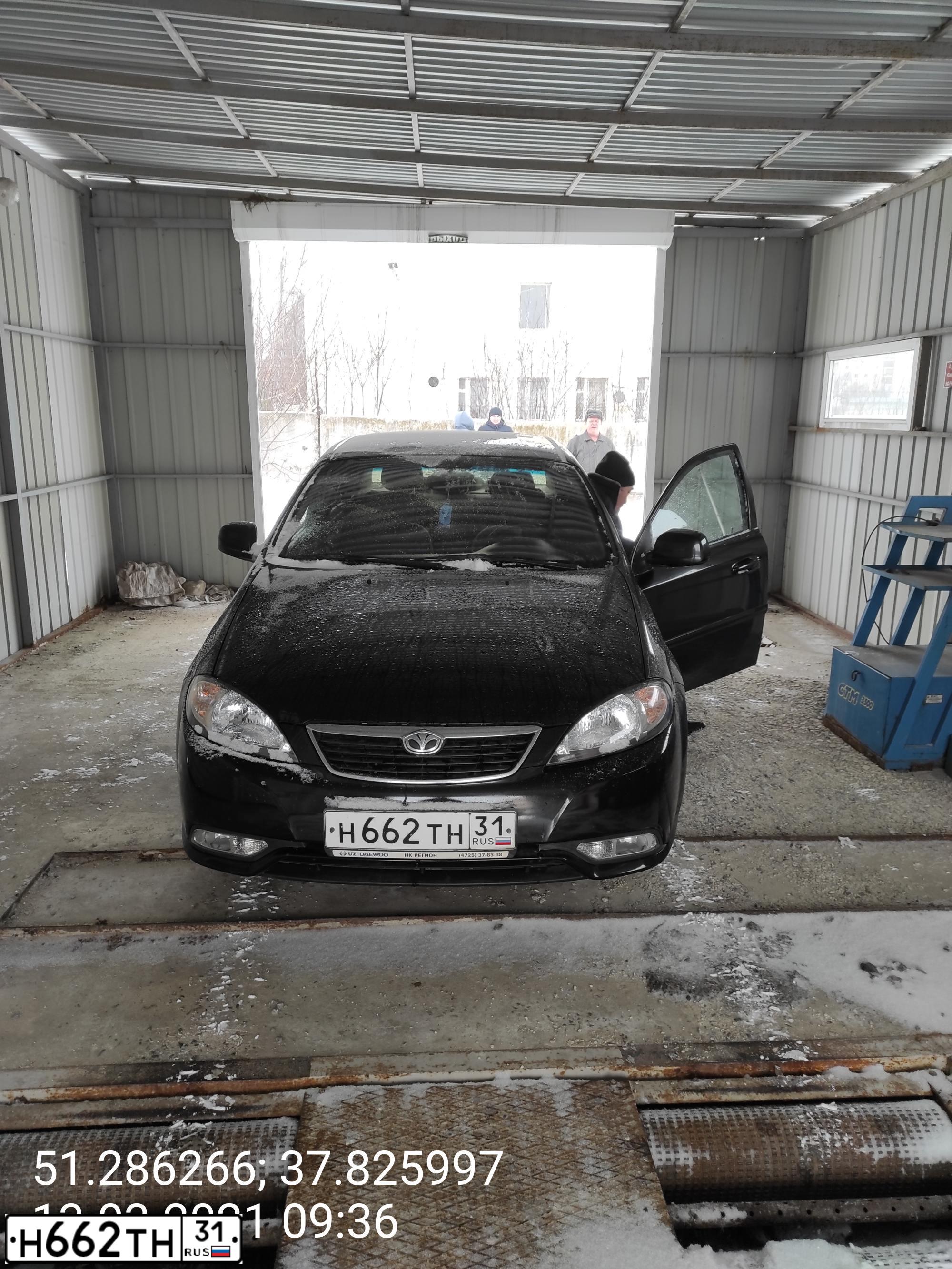 Фото автомобиля DAEWOO GENTRA, 2013 — госномер Н662ТН31. Цвет: БЛЕДНО-ЧЕРНЫЙ