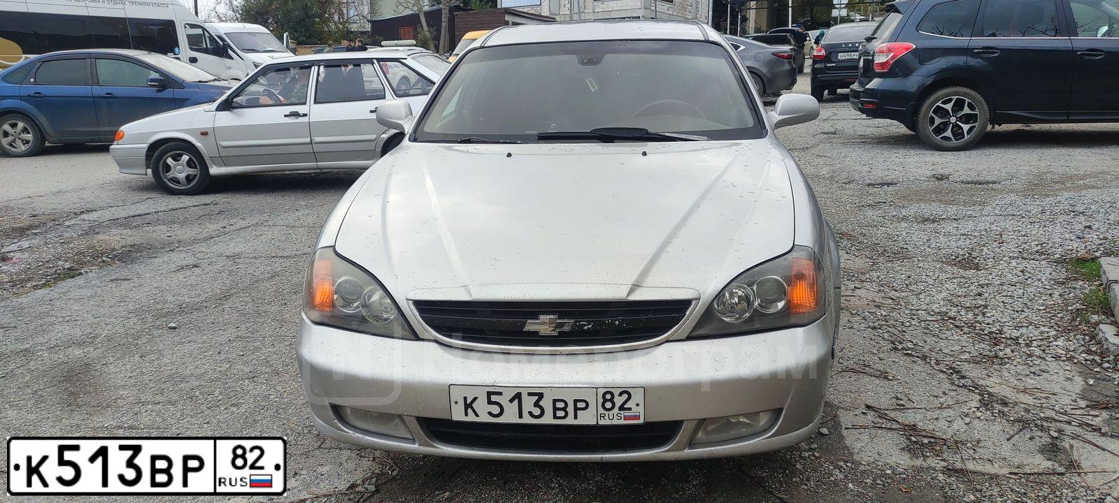 Фото автомобиля CHEVROLET EVANDA, 2005 — госномер К513ВР82. Цвет: СЕРЕБРИСТЫЙ