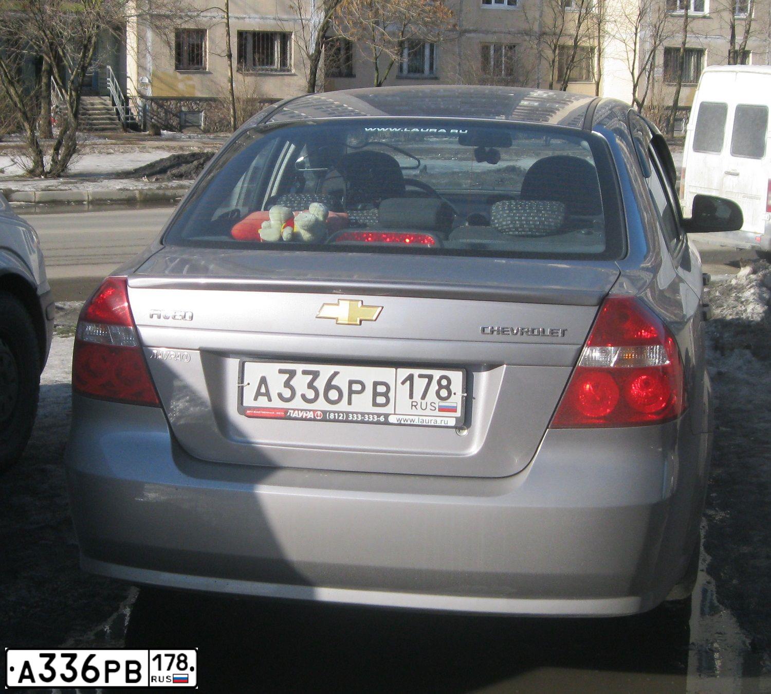 Фото автомобиля CHEVROLET AVEO, 2010 — госномер В515НТ01. Цвет: СЕРЫЙ