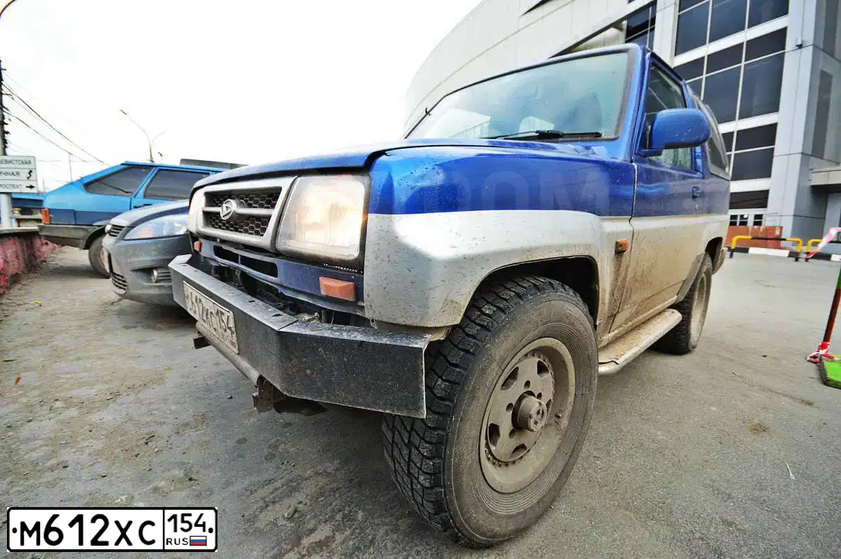 Фото автомобиля IZH 2125, 1985 — госномер М612ХС154. Цвет: ГОБИ