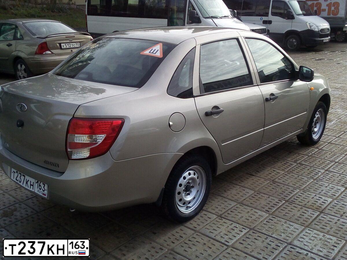Фото автомобиля LADA 2190 GRANTA, 2013 — госномер Т237КН163. Цвет: СЕРО-БЕЖЕВЫЙ