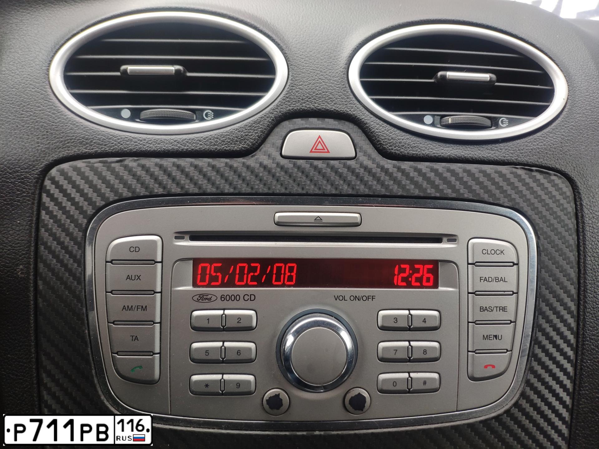Фото автомобиля FORD FOCUS, 2008 — госномер Н037НТ18. Цвет: темно-серый