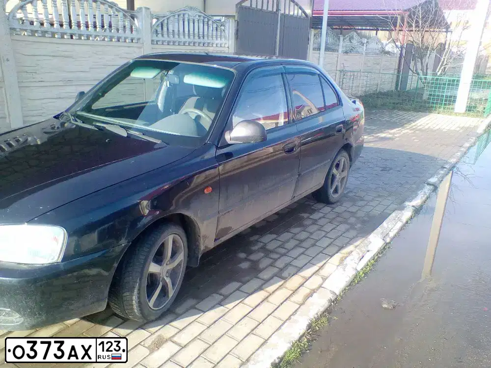 Фото автомобиля TAGAZ ACCENT, 2008 — госномер Е955КА193. Цвет: ЧЕРНЫЙ
