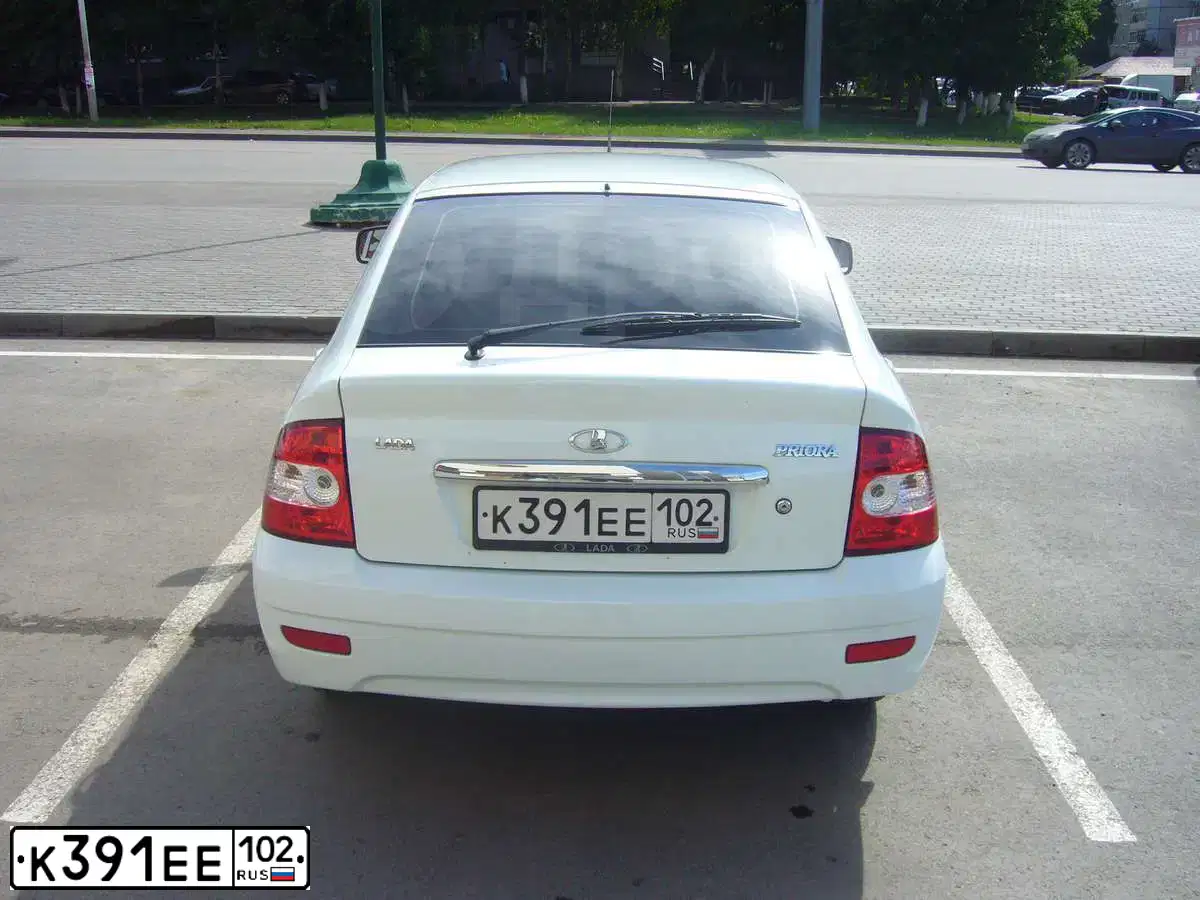 Фото автомобиля LADA 2172 PRIORA, 2012 — госномер А309АМ156. Цвет: Белый