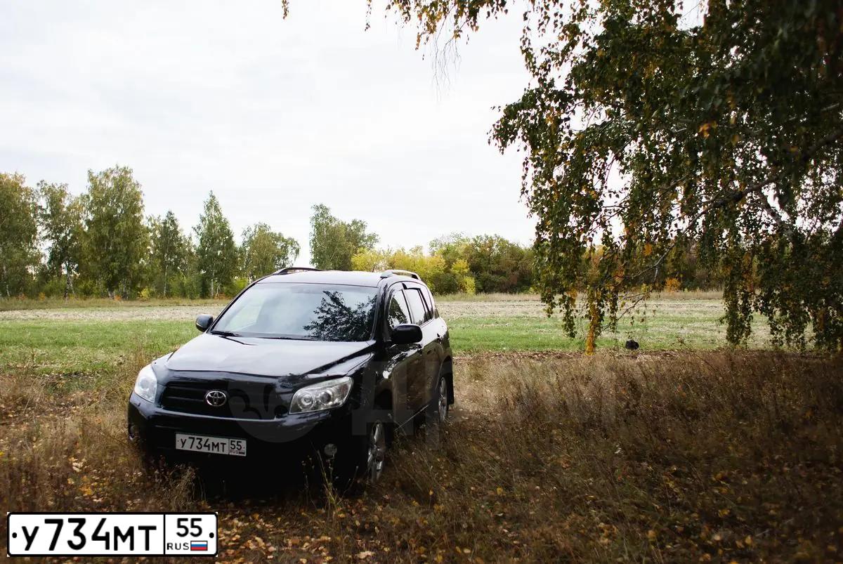 Фото автомобиля TOYOTA RAV4, 2006 — госномер С830ОР70. Цвет: ЧЕРНЫЙ