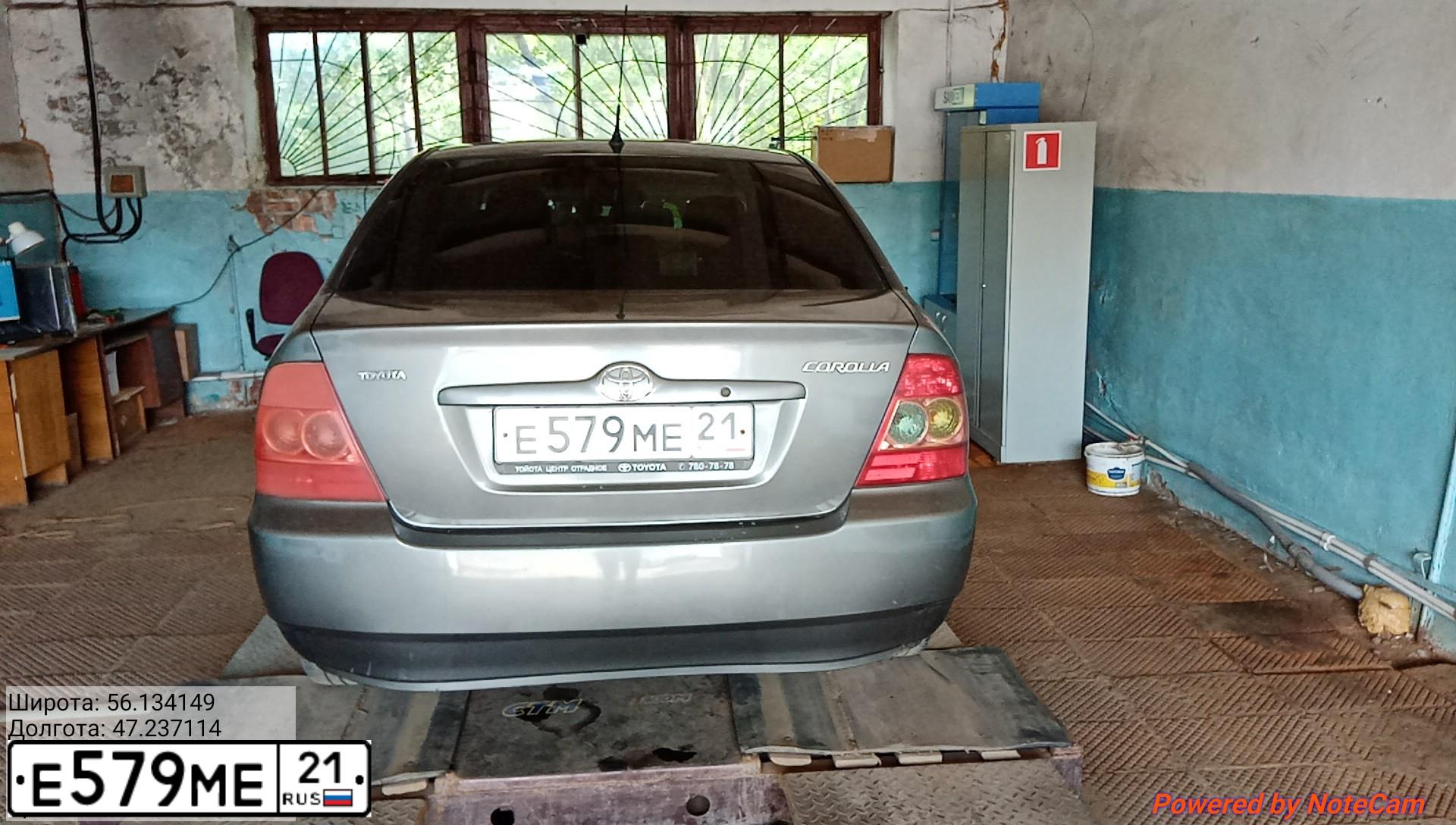 Фото автомобиля TOYOTA COROLLA, 2006 — госномер Е579МЕ21. Цвет: СЕРЫЙ
