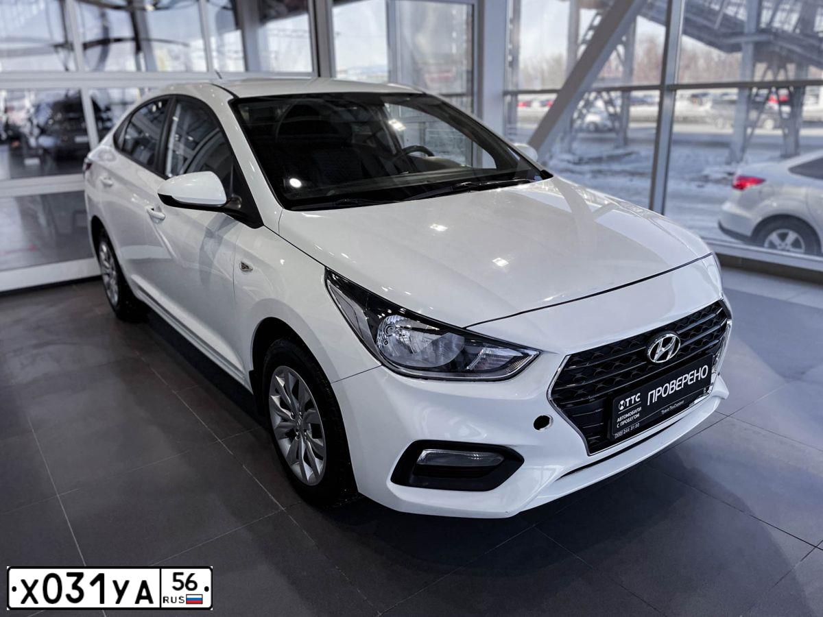 Фото автомобиля HYUNDAI SOLARIS, 2019 — госномер Х031УА56. Цвет: БЕЛЫЙ