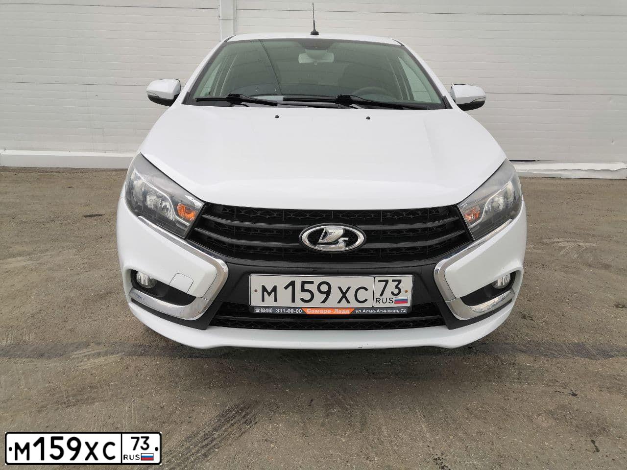 Фото автомобиля LADA VESTA, 2016 — госномер А976СО122. Цвет: Белый