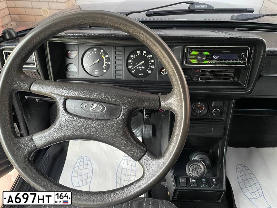 Фото автомобиля LADA 2107, 2010 — госномер Т714АМ58. Цвет: Сине-Черный