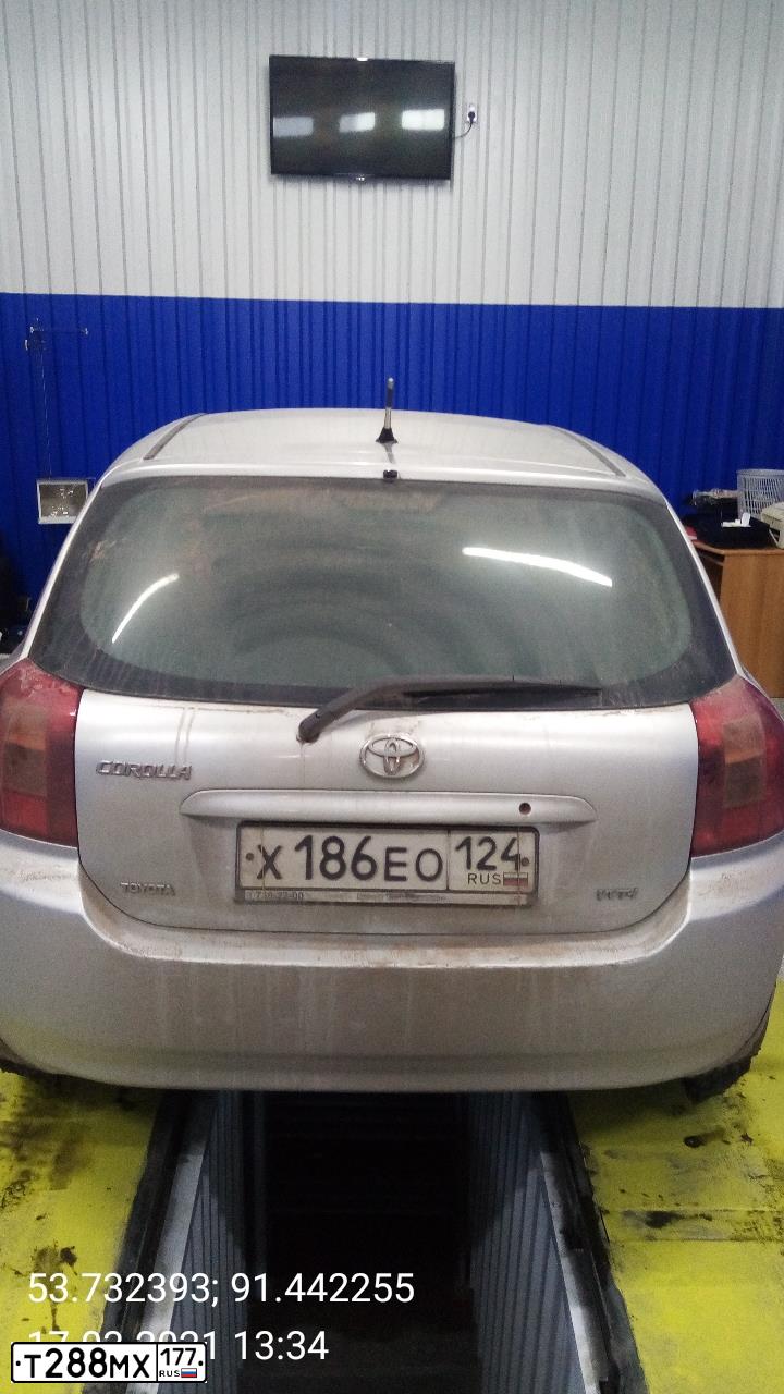 Фото автомобиля TOYOTA COROLLA, 2003 — госномер Н220КС19. Цвет: Серый