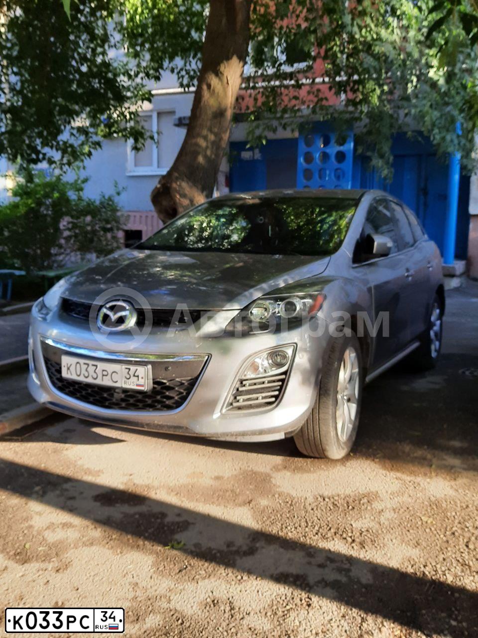 Фото автомобиля MAZDA CX-7, 2010 — госномер К033РС34. Цвет: СЕРЕБРИСТЫЙ