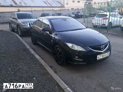 Фото автомобиля MAZDA 3, 2006 — госномер А567МХ73. Цвет: СЕРО-ЗОЛОТИСТЫЙ
