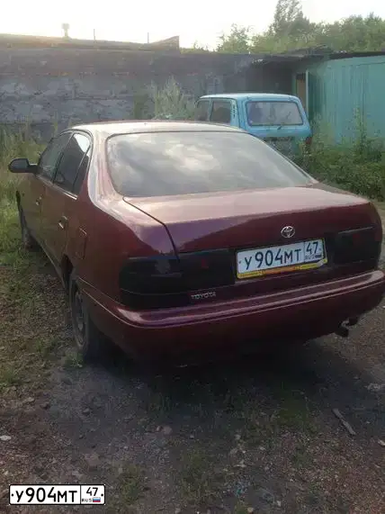 Фото автомобиля TOYOTA CARINA, 1997 — госномер У904МТ47. Цвет: ТЕМНО-ВИШНЕВЫЙ