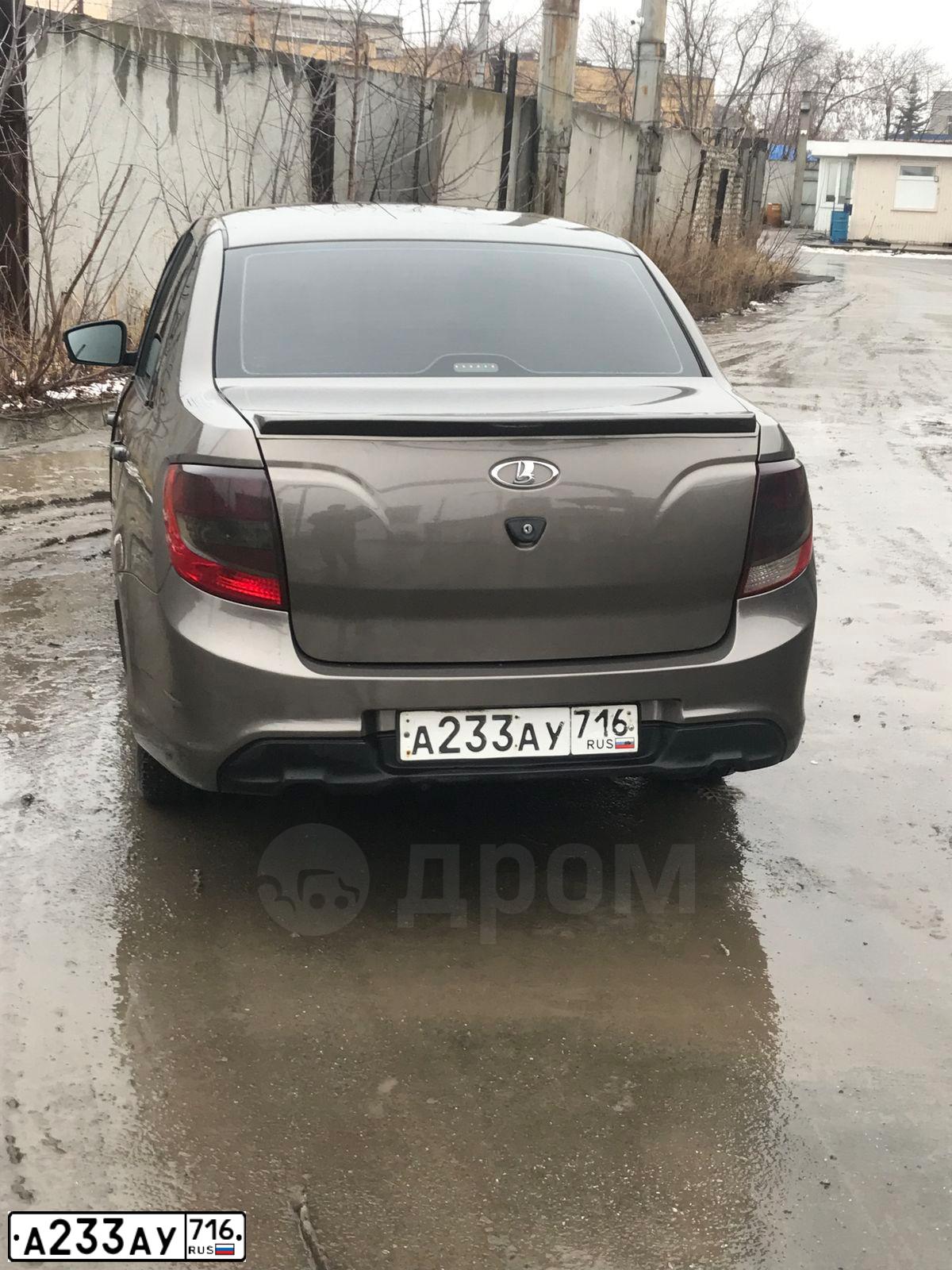 Фото автомобиля LADA 2190 GRANTA, 2017 — госномер А233АУ716. Цвет: Золотисто-коричневый