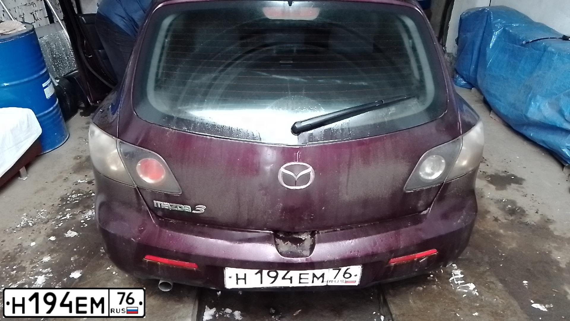 Фото автомобиля MAZDA 3, 2007 — госномер Н194ЕМ76. Цвет: Красный