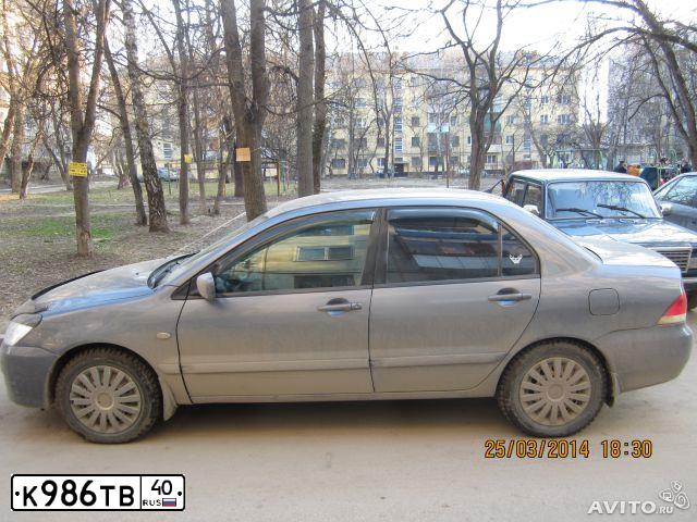 Фото автомобиля MITSUBISHI LANCER, 2005 — госномер Р960ВА40. Цвет: СЕРЫЙ