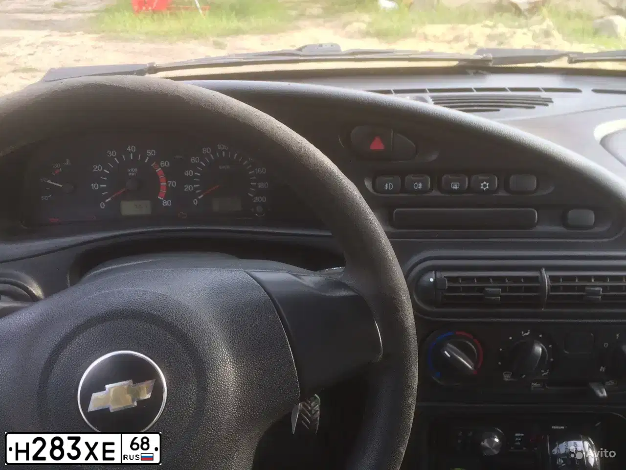 Фото автомобиля CHEVROLET NIVA, 2012 — госномер Н283ХЕ68. Цвет: Темно-серый металлик