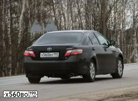 Фото автомобиля TOYOTA CAMRY, 2008 — госномер Х560ВО199. Цвет: ЧЕРНЫЙ