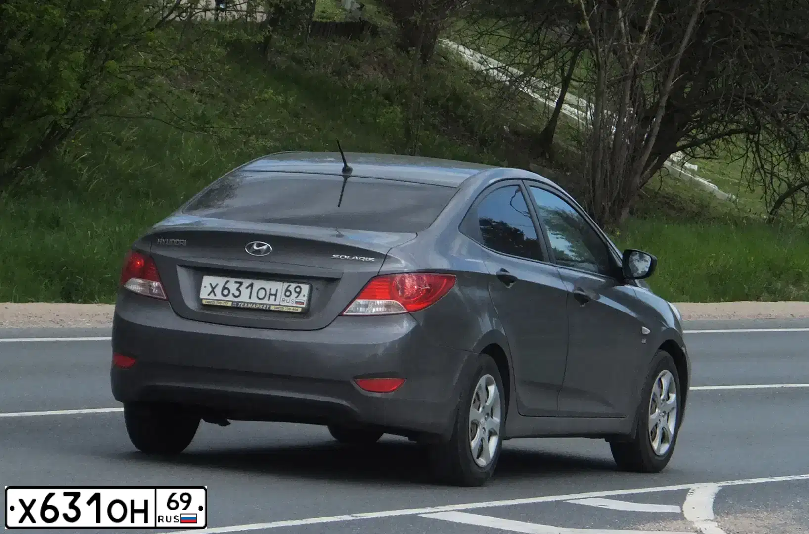 Фото автомобиля HYUNDAI SOLARIS, 2011 — госномер Х631ОН69. Цвет: ЧЕРНО-СЕРЫЙ