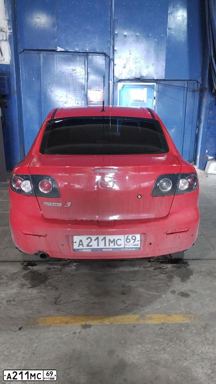 Фото автомобиля MAZDA A 3, 2008 — госномер А211МС69. Цвет: Красный
