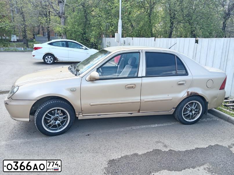 Фото автомобиля GEELY CK, 2007 — госномер О366АО774. Цвет: ЖЕЛТЫЙ