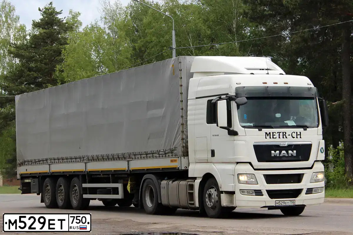 Фото автомобиля MAN TGX 18.XXX /4X2/, 2013 — госномер М529ЕТ750. Цвет: Белый