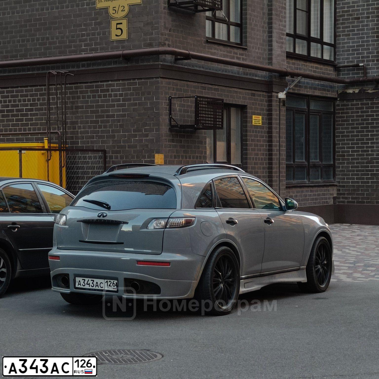 Фото автомобиля INFINITI QX70 /FX/, 2005 — госномер О212МР01. Цвет: Темно-синий