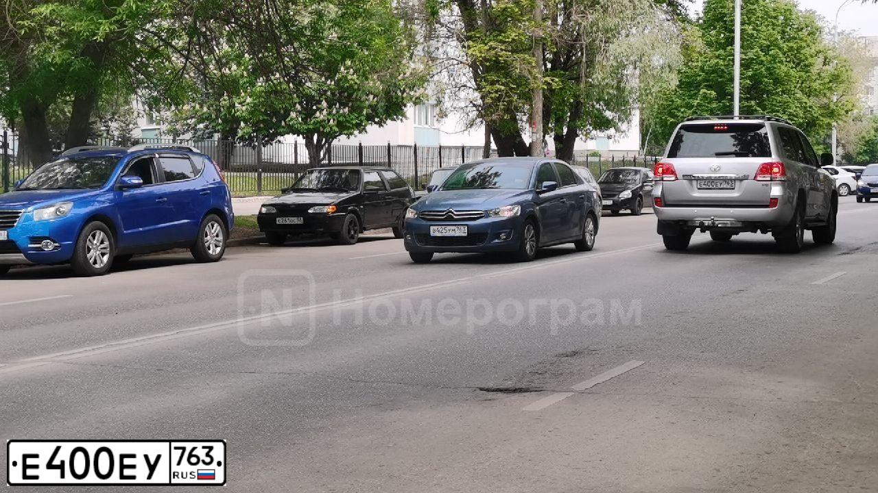 Фото автомобиля TOYOTA CAMRY, 2007 — госномер Е119ВХ763. Цвет: Белый