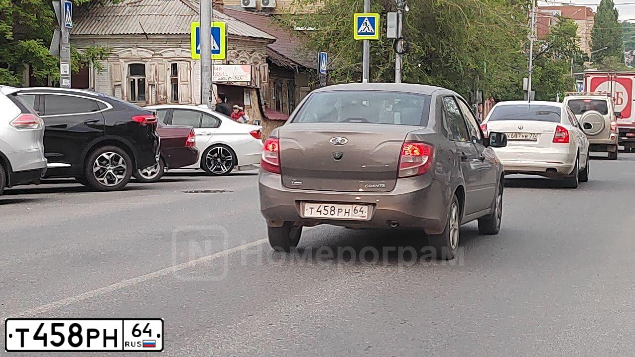 Фото автомобиля LADA 2190 GRANTA, 2013 — госномер Т458РН64. Цвет: ЗОЛОТИСТО КОРИЧНЕВЫЙ