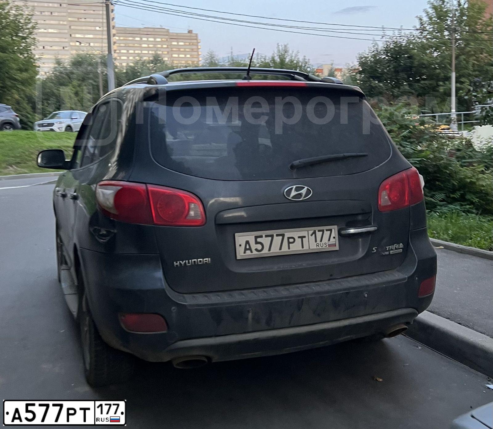 Фото автомобиля KIA SPORTAGE, 2007 — госномер А577РТ177. Цвет: ЧЕРНЫЙ
