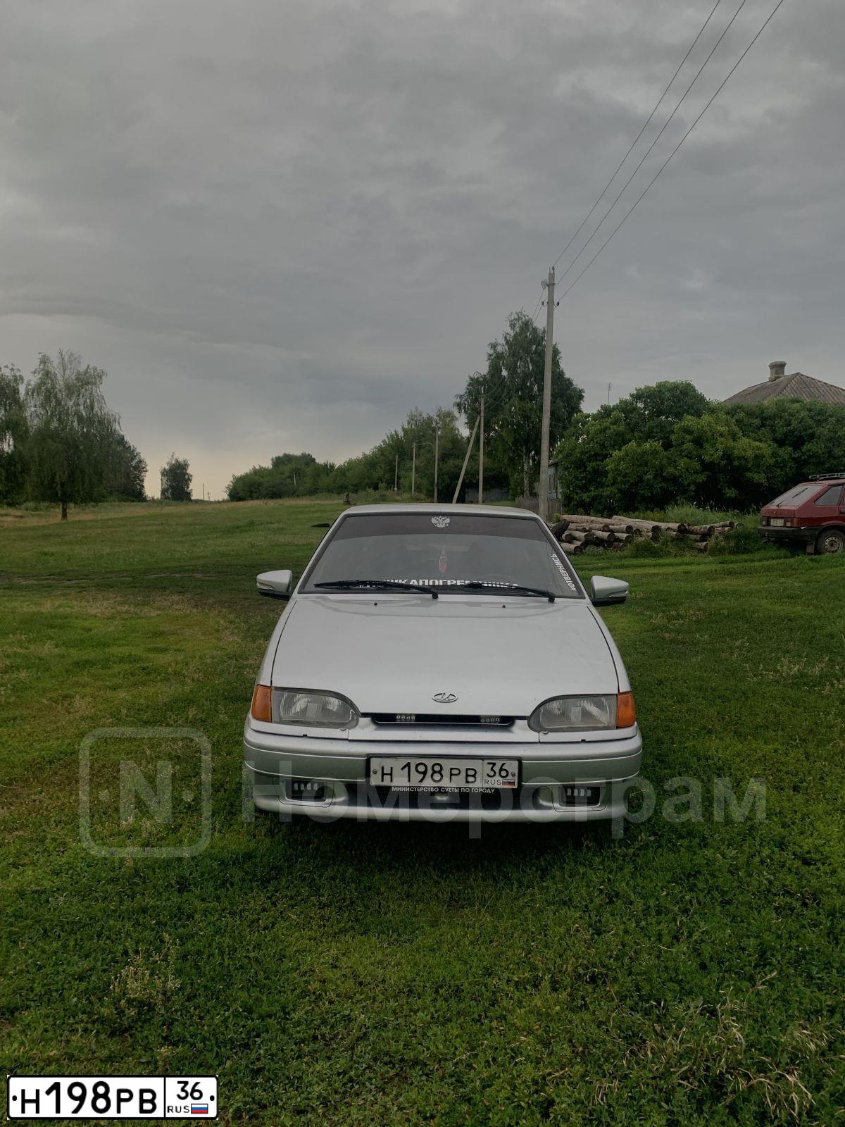Фото автомобиля LADA 2114 SAMARA, 2009 — госномер Н198РВ36. Цвет: СЕРЕБРИСТЫЙ