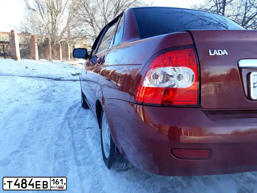 Фото автомобиля LADA 2170 PRIORA, 2008 — госномер Т484ЕВ161. Цвет: ЗОЛОТИСТО-КРАСНЫЙ