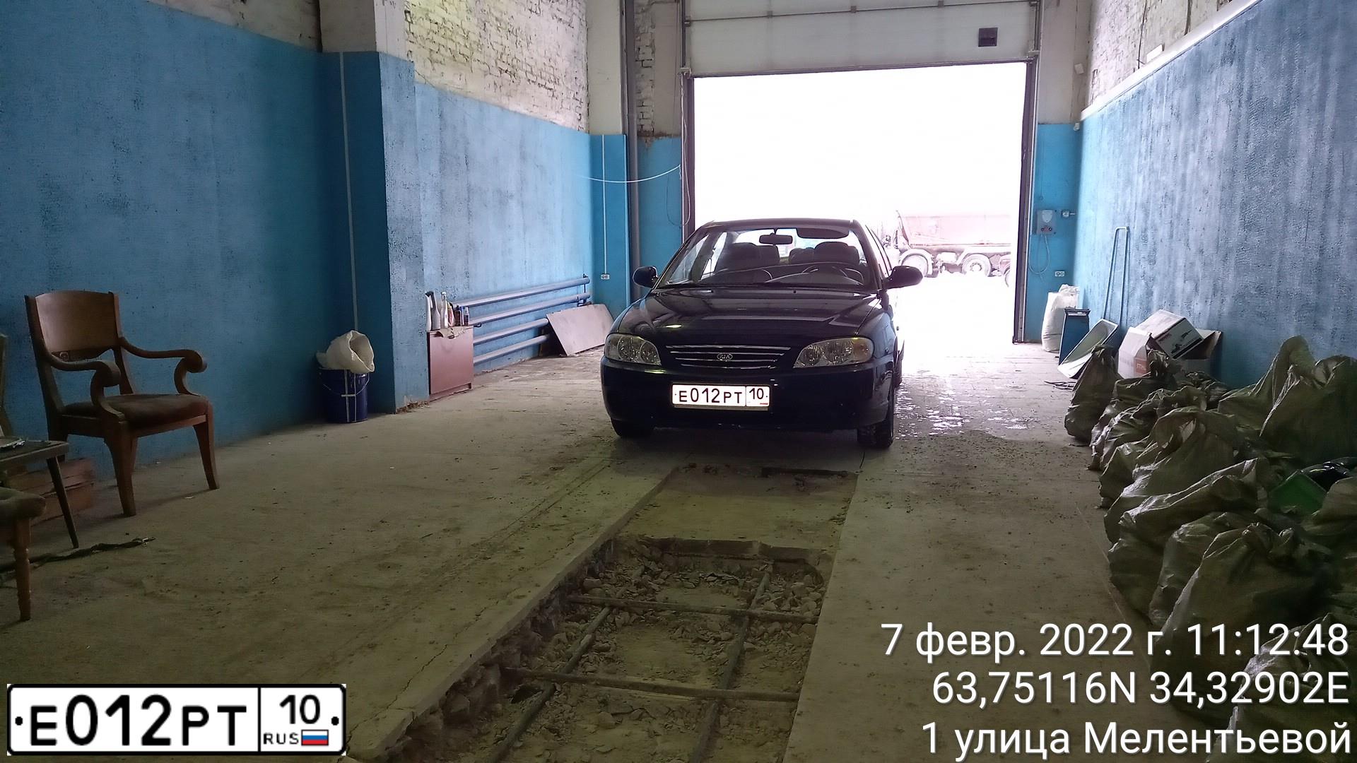 Фото автомобиля KIA SPECTRA, 2007 — госномер Е012РТ10. Цвет: ТЕМНО-СИНИЙ