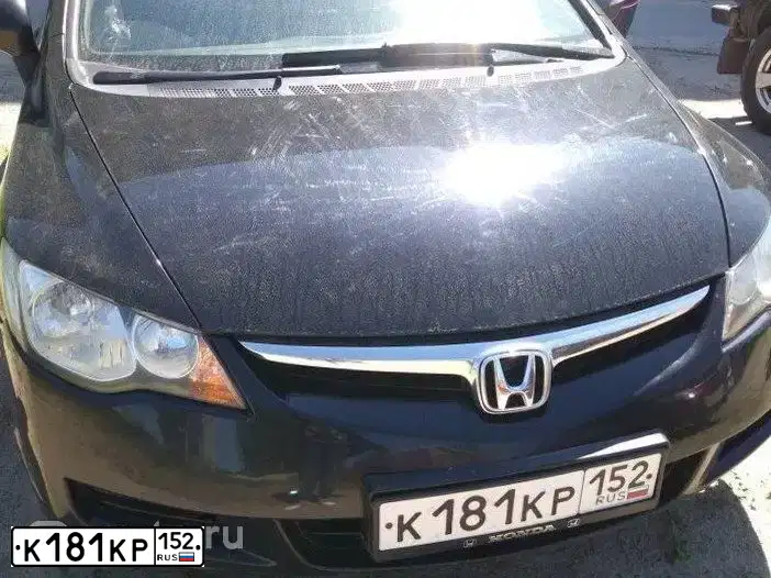 Фото автомобиля HONDA CIVIC, 2007 — госномер Е712ХВ177. Цвет: ЧЕРНЫЙ