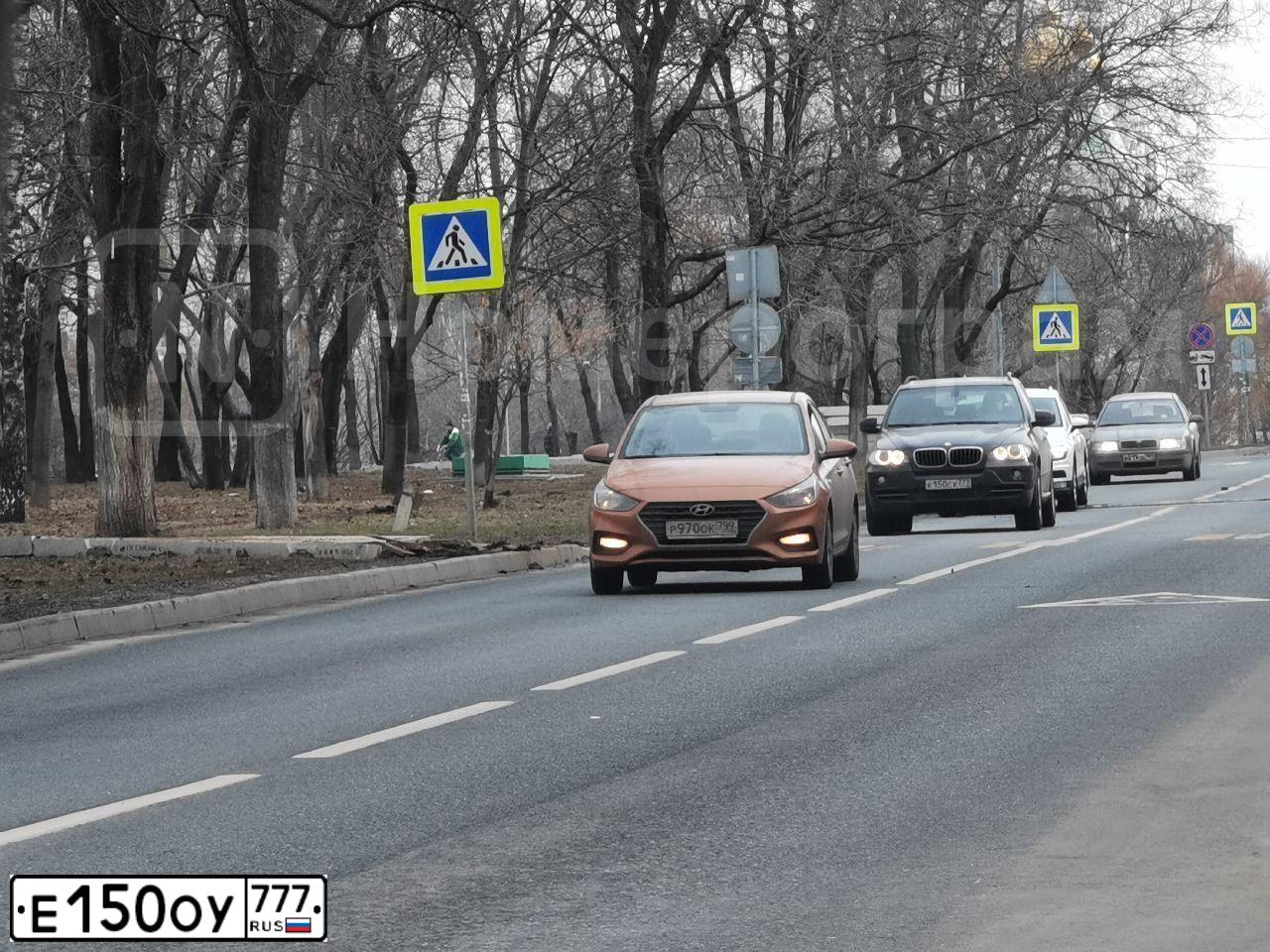 Фото автомобиля MITSUBISHI PAJERO SPORT, 2015 — госномер Е150ОУ777. Цвет: ЧЕРНЫЙ