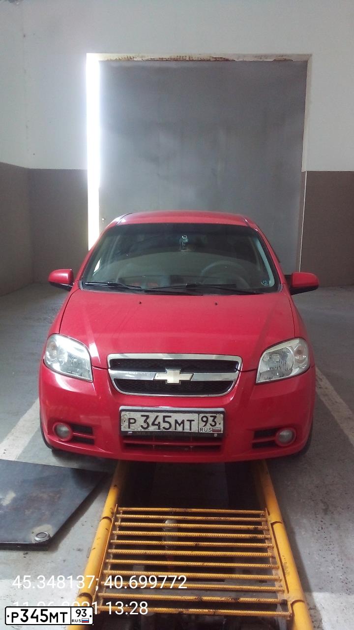 Фото автомобиля CHEVROLET AVEO, 2007 — госномер Р345МТ93. Цвет: Красный
