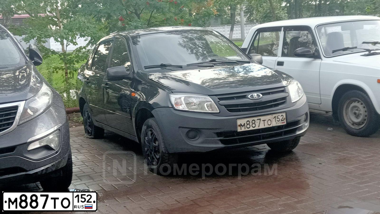 Фото автомобиля LADA 2190 GRANTA, 2012 — госномер М887ТО152. Цвет: СЕРО-ЧЕРНЫЙ