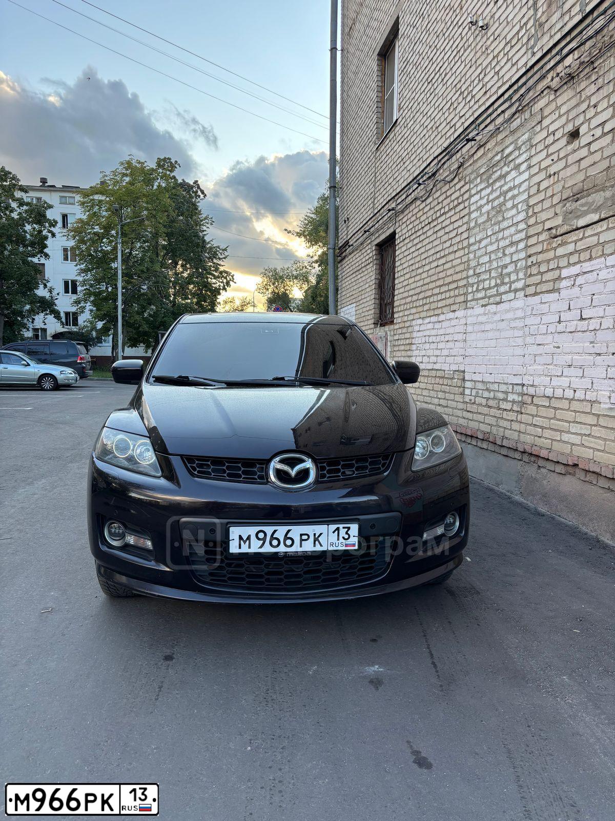 Фото автомобиля MAZDA CX-7, 2008 — госномер Н888СК199. Цвет: ТЕМНО-ВИШНЕВЫЙ