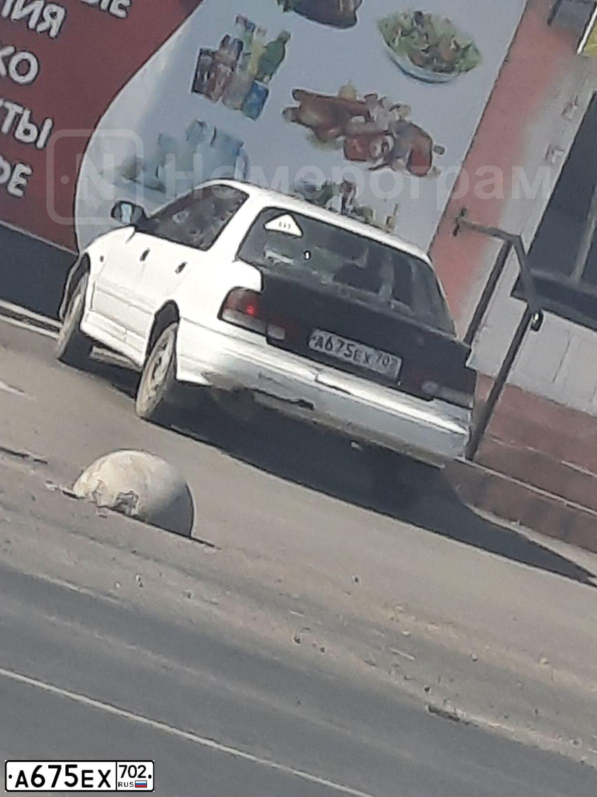 Фото автомобиля HYUNDAI LANTRA, 1995 — госномер А675ЕХ702. Цвет: Белый